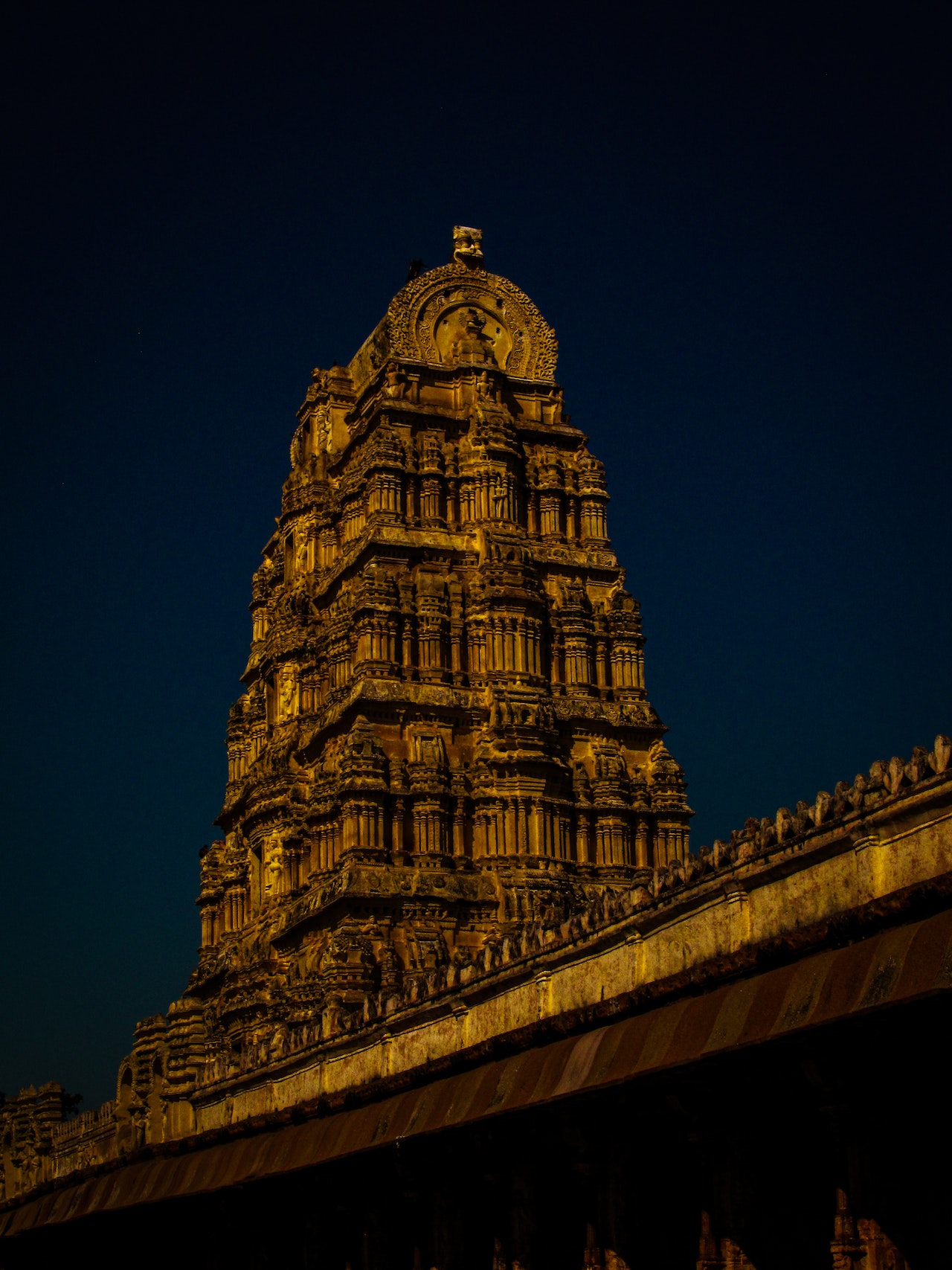 Virupaksha Temple: Majestic South Indian temple with intricate architecture and vibrant colors.