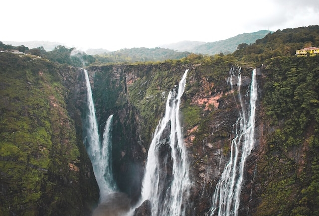 Jog Falls in Karnataka, India: A breathtaking cascade of water plunging down a lush green valley.