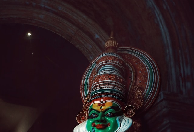 Vibrant Kerala tradition: Traditional attire, Kathakali dance, lush greenery.