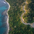 Panoramic view of the pristine beaches and lush greenery of the Andaman and Nicobar Islands, showcasing the natural beauty and serene landscapes of this tropical paradise.