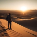 Solo travel Adventure solo traveler embracing the golden desert landscape