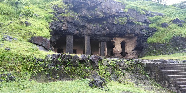 A mesmerizing view of intricately carved rock sculptures and structures on Elephanta Island, showcasing the ancient wonders and cultural richness of the site.