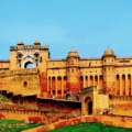 A panoramic view of Amber Palace, showcasing its regal architecture, intricate designs, and the surrounding hills, encapsulating the royal splendor of Jaipur's historic gem.