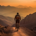 A breathtaking panoramic view of cyclists pedaling through scenic landscapes during an epic cycling journey.