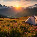 A mesmerizing sunset over the serene mountains, showcasing the beauty of camping in India.