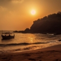 Sunset view of pristine Gokarna beach with golden sands and calm waves.