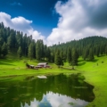 Khajjiar, a serene landscape nestled in the Himalayas, surrounded by lush greenery and snow-capped peaks."