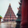 Rameshwaram Revealed book cover featuring a serene shoreline, adorned with sacred temples and cultural motifs.