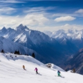 A panoramic view of snow-covered Auli, Uttarakhand, with skiers enjoying the pristine slopes.