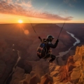 An adventurous couple reaching the summit of a majestic mountain, overlooking a breathtaking landscape.